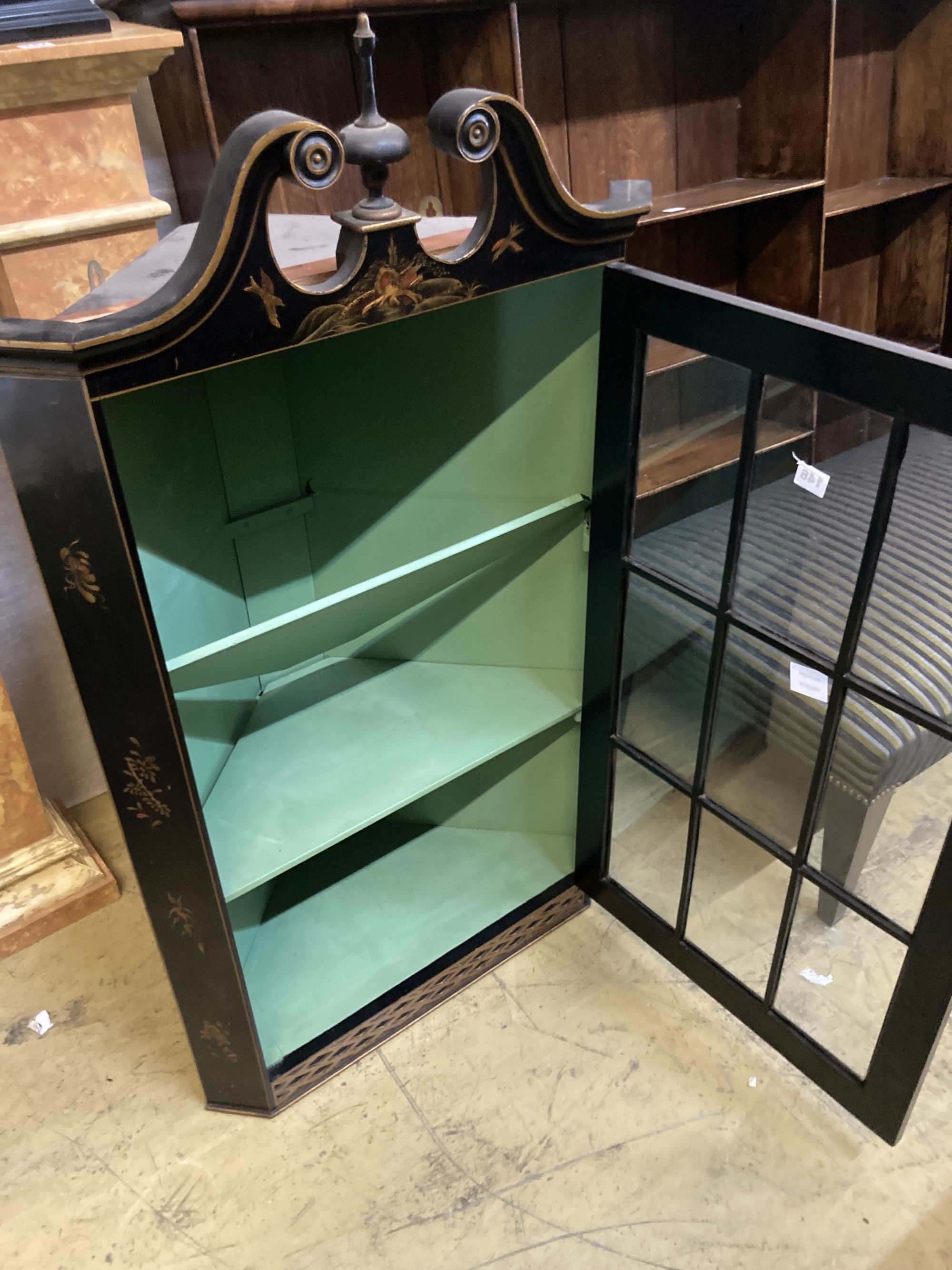 A 1920s chinoiserie lacquer hanging corner cabinet, width 66cm, depth 36cm, height 115cm